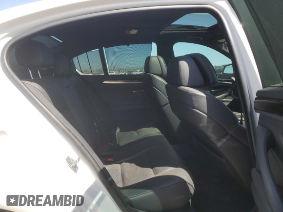 2013 BMW 5 Series 550i xDrive with VIN WBAFU9C52DDY71651, listed as a Copart auction lot 52156465 with 144,211 mi miles and Salvage title. Bid and sale history available at DreamBid. Image 10.