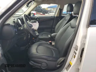 2013 MINI Countryman with VIN WMWZB3C5XDWM31715, listed as a Copart auction lot 57028565 with 95,453 mi miles and Salvage title. Bid and sale history available at DreamBid. Image 7.