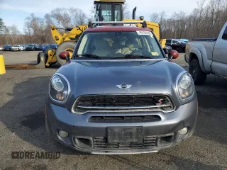 2016 MINI Countryman S z VIN WMWZC5C52GWP49650, wystawiony jako Copart lot #49153185 z przebiegiem 166 695 mil mil oraz Szkody całkowita. Historia ofert i sprzedaży dostępna na DreamBid. Obrazek 5.