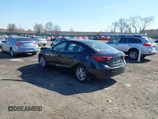 2016 Mazda 3 i Sport with VIN JM1BM1U73G1337468, listed as a IAAI auction lot 41824105 with 96,959 mi miles. Bid and sale history available at carsss.com. Image 3.