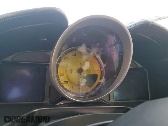 2019 Ferrari Portofino z VIN ZFF89FPAXK0242549, wystawiony jako Copart lot #74454234 z przebiegiem Nie podano mil oraz Nie do naprawy. Historia ofert i sprzedaży dostępna na DreamBid. Obrazek 9.