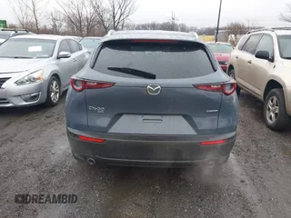 2024 Mazda CX-30 S Carbon Edition z VIN 3MVDMBCM7RM606050, wystawiony jako IAAI lot #41807459 z przebiegiem 7908 mil mil oraz . Historia ofert i sprzedaży dostępna na DreamBid. Obrazek 16.