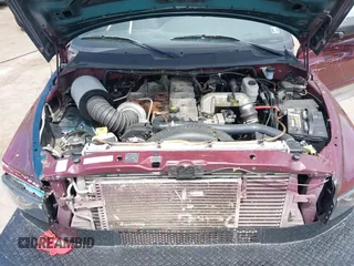 2002 Dodge 2500 z VIN 3B7KF23C92M244271, wystawiony jako IAAI lot #42104621 z przebiegiem 179 986 mil mil oraz . Historia ofert i sprzedaży dostępna na DreamBid. Obrazek 10.