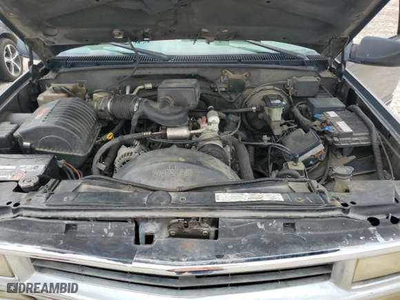 1999 Chevrolet Tahoe with VIN 1GNEC13R6XR150124, listed as a Copart auction lot 70630524 with 238,990 mi miles and Salvage Title. Bid and sale history available at carsss.com. Image 12.