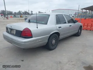 2005 Ford Police Interceptor with VIN 2FAFP71W65X163932, listed as a IAAI auction lot 41531164 with 268,769 mi miles. Bid and sale history available at carsss.com. Image 4.