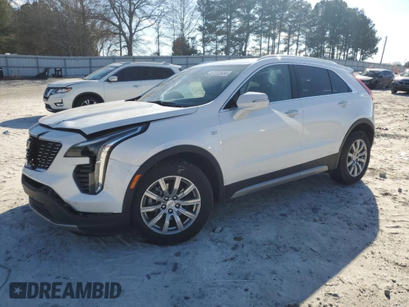 2022 Cadillac XT4 FWD Premium Luxury with VIN 1GYFZCR45NF100049, listed as a Copart auction lot 87232634 with 62,391 mi miles and Salvage title. Bid and sale history available at DreamBid. Image 1.
