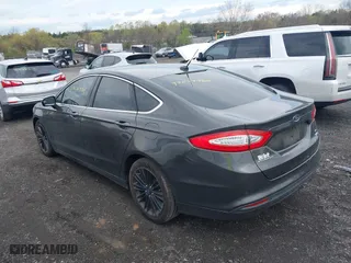 2016 Ford Fusion SE with VIN 3FA6P0HD4GR169113, listed as a IAAI auction lot 42037905 with 105,316 mi miles. Bid and sale history available at carsss.com. Image 3.