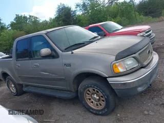 2003 Ford F-150 XLT with VIN 1FTRW08L63KD06455, listed as a IAAI auction lot 41988549 with 138,168 mi miles. Bid and sale history available at carsss.com. Image 13.