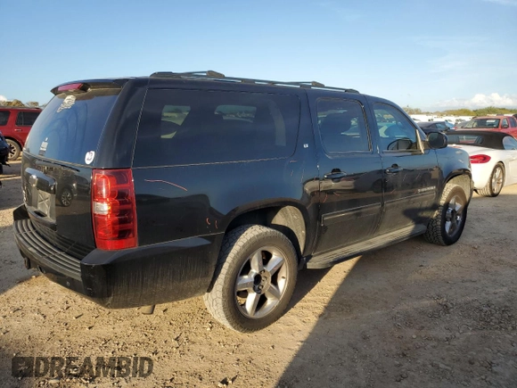 2014 Chevrolet Suburban LT with VIN 1GNSCJE03ER202873, listed as a Copart auction lot 85142854 with 213,850 mi miles and Salvage Title. Bid and sale history available at carsss.com. Image 3.