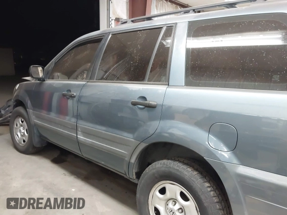 2005 Honda Pilot LX z VIN 2HKYF18135H537704, wystawiony jako IAAI lot #41091540 z przebiegiem Nie podano mil oraz . Historia ofert i sprzedaży dostępna na DreamBid. Obrazek 15.