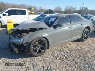 2019 Chrysler 300 with VIN 2C3CCABG5KH708249, listed as a IAAI auction lot 41833377 with 90,448 mi miles. Bid and sale history available at carsss.com. Image 2.