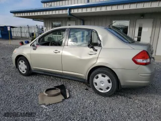 2007 Nissan Versa 1.8 S with VIN 3N1BC11E67L454060, listed as a Copart auction lot 86876104 with 100,485 mi miles and Salvage Title. Bid and sale history available at carsss.com. Image 2.