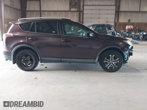 2016 Toyota RAV4 LE with VIN 2T3BFREV3GW430479, listed as a IAAI auction lot 40501022 with 126,835 mi miles. Bid and sale history available at carsss.com. Image 14.