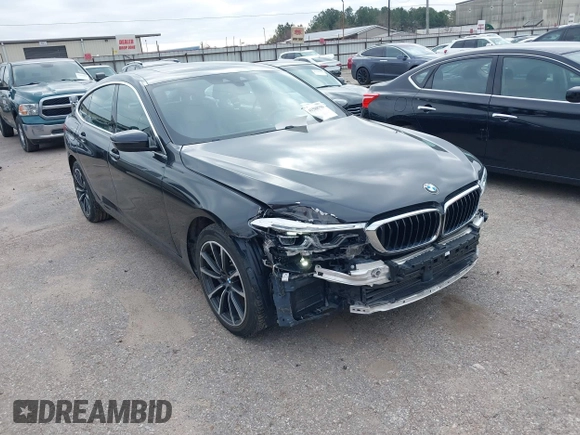 2019 BMW 6 Series 640i xDrive with VIN WBAJV6C50KBK08934, listed as a IAAI auction lot 41588796 with 61,411 mi miles and . Bid and sale history available at carsss.com. Image 1.