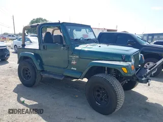 2000 Jeep Wrangler Sahara with VIN 1J4FA59S4YP805067, listed as a IAAI auction lot 42497152 with 243,692 mi miles and . Bid and sale history available at DreamBid. Image 1.