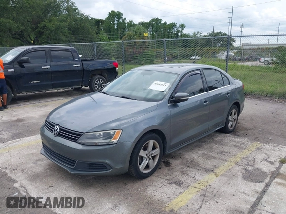 2013 Volkswagen Jetta TDI w/Premium with VIN 3VWLL7AJ4DM351806, listed as a IAAI auction lot 42654515 with 146,910 mi miles and . Bid and sale history available at DreamBid. Image 2.