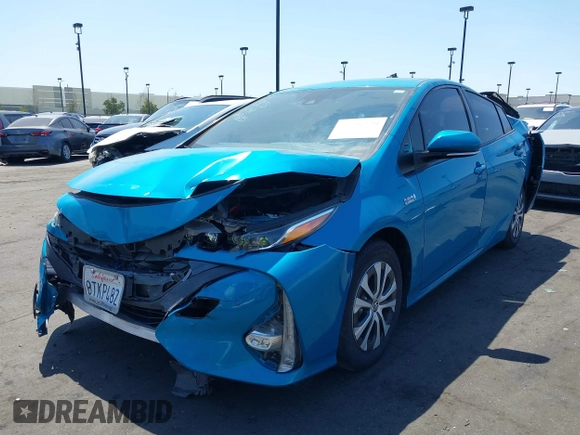 2021 Toyota Prius LE with VIN JTDKAMFP7M3169633, listed as a IAAI auction lot 41986170 with 55,925 mi miles and . Bid and sale history available at DreamBid. Image 19.
