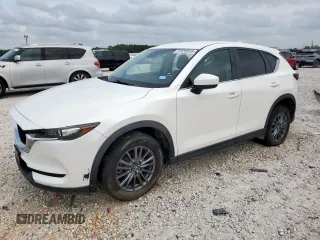 2020 Mazda CX-5 Touring z VIN JM3KFACM6L0787687, wystawiony jako Copart lot #57639555 z przebiegiem 91 219 mil mil oraz Szkoda całkowita • Salvage title. Historia ofert i sprzedaży dostępna na DreamBid. Obrazek 1.