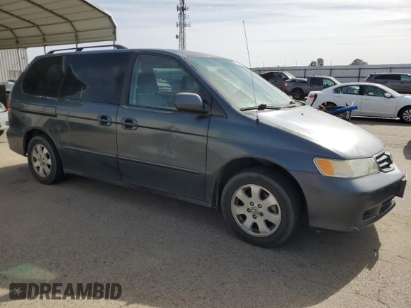 2003 Honda Odyssey EX with VIN 5FNRL18663B048864, listed as a Copart auction lot 53429345 with 259,807 mi miles and Salvage Title. Bid and sale history available at DreamBid. Image 4.