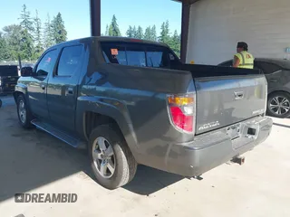 2007 Honda Ridgeline RTL with VIN 2HJYK16537H529904, listed as a IAAI auction lot 42626859 with 294,953 mi miles and . Bid and sale history available at DreamBid. Image 3.