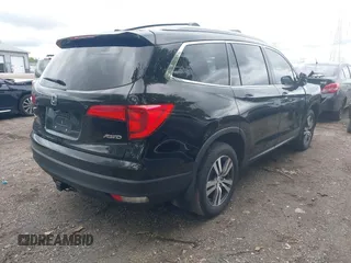 2018 Honda Pilot EX-L z VIN 5FNYF6H53JB009282, wystawiony jako IAAI lot #42331361 z przebiegiem 98 127 mil mil oraz . Historia ofert i sprzedaży dostępna na DreamBid. Obrazek 4.