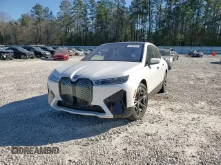 2024 BMW iX M60 with VIN WB533CF04RCP50036, listed as a Copart auction lot 47402505 with 9,345 mi miles and Salvage Title. Bid and sale history available at carsss.com. Image 10.