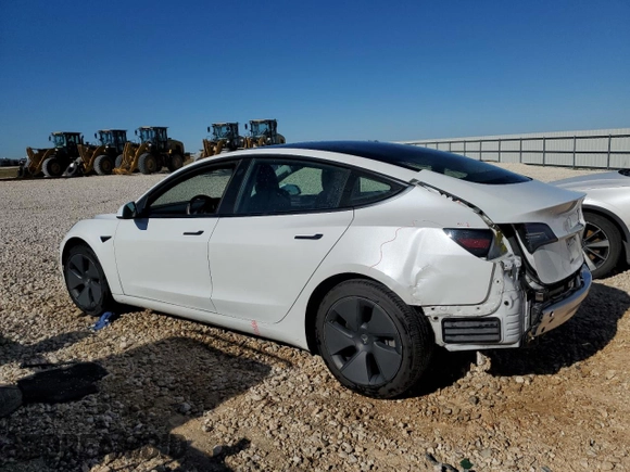 2021 Tesla Model 3 Standard Range Plus with VIN 5YJ3E1EA7MF089997, listed as a Copart auction lot 81528284 with 147,242 mi miles and Clean Title. Bid and sale history available at DreamBid. Image 2.