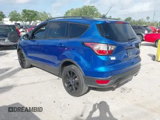 2018 Ford Escape SE z VIN 1FMCU0GD2JUC27271, wystawiony jako IAAI lot #41947047 z przebiegiem 154 672 mil mil oraz . Historia ofert i sprzedaży dostępna na DreamBid. Obrazek 3.
