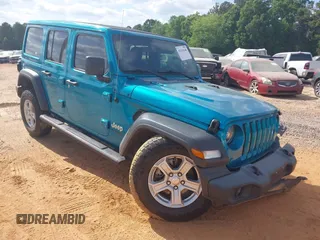 2020 Jeep Wrangler Unlimited Sport z VIN 1C4HJXDG4LW331133, wystawiony jako IAAI lot #42154246 z przebiegiem 87 668 mil mil oraz . Historia ofert i sprzedaży dostępna na DreamBid. Obrazek 1.