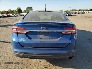 2018 Ford Fusion SE z VIN 3FA6P0H71JR107704, wystawiony jako Copart lot #75017244 z przebiegiem 202 999 mil mil oraz Nie do naprawy • Non repairable. Historia ofert i sprzedaży dostępna na DreamBid. Obrazek 6.
