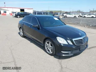 2013 Mercedes-Benz E-Class E 350 Luxury with VIN WDDHF8JBXDA716958, listed as a IAAI auction lot 42080974 with 134,248 mi miles. Bid and sale history available at carsss.com. Image 1.