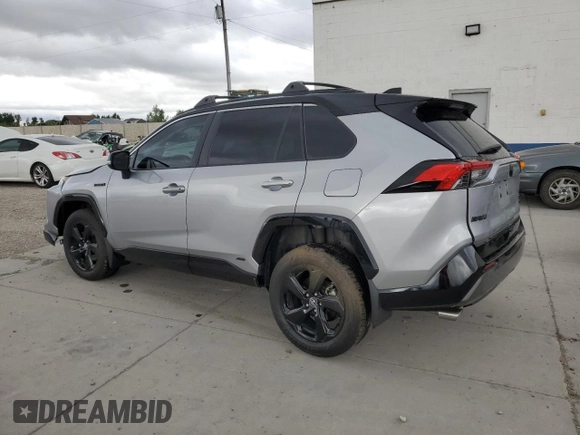 2021 Toyota RAV4 Hybrid XSE with VIN 4T3E6RFV2MU016441, listed as a Copart auction lot 57090975 with 69,304 mi miles and Salvage title. Bid and sale history available at DreamBid. Image 2.