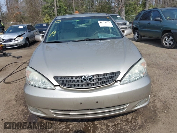 2004 Toyota Camry LE with VIN 4T1BF30K94U587836, listed as a IAAI auction lot 41714277 with 211,893 mi miles and . Bid and sale history available at carsss.com. Image 12.