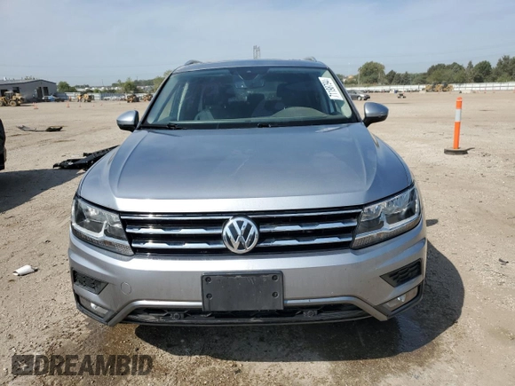 2021 Volkswagen Tiguan SE with VIN 3VV3B7AX8MM115493, listed as a Copart auction lot 71198794 with 34,958 mi miles and Salvage Title. Bid and sale history available at DreamBid. Image 5.