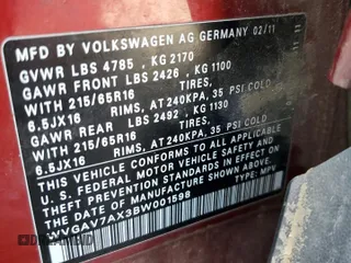2011 Volkswagen Tiguan S z VIN WVGAV7AX3BW001598, wystawiony jako Copart lot #57518545 z przebiegiem 135 668 mil mil oraz Szkoda całkowita • Salvage title. Historia ofert i sprzedaży dostępna na DreamBid. Obrazek 13.