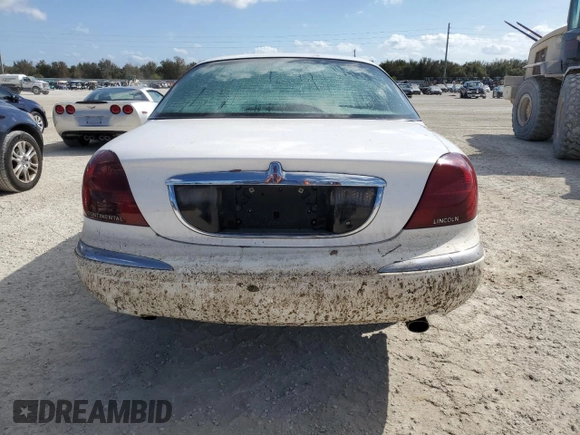 1998 Lincoln Continental with VIN 1LNFM97V5WY637895, listed as a Copart auction lot 77020154 with 0 mi miles and Salvage Title. Bid and sale history available at carsss.com. Image 6.