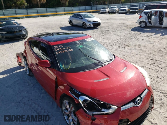2012 Hyundai Veloster w/Black Int с VIN KMHTC6AD2CU033213, выставлен на аукционе Copart как лот 52168112 с пробегом 85 929 миль миль и На запчасти • Non repairable. История ставок и продаж доступна на DreamBid. Изображение 9.