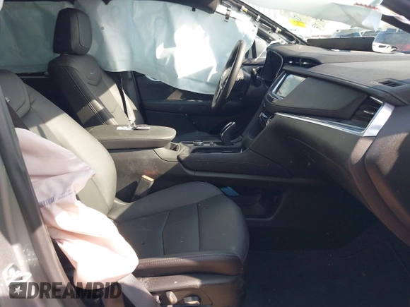 2025 Cadillac XT5 FWD Premium Luxury with VIN 1GYKNCRS1SZ120351, listed as a IAAI auction lot 41334881 with 4,915 mi miles. Bid and sale history available at carsss.com. Image 5.