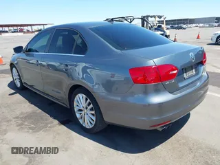 2011 Volkswagen Jetta SEL with VIN 3VWLZ7AJ4BM023877, listed as a IAAI auction lot 42054594 with 103,680 mi miles and . Bid and sale history available at DreamBid. Image 3.
