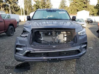 2024 Infiniti QX80 LUXE with VIN JN8AZ2AE8R9330286, listed as a Copart auction lot 73105994 with 830 mi miles and Salvage Title. Bid and sale history available at carsss.com. Image 5.