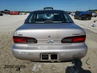 1996 Geo Prizm z VIN 1Y1SK5267TZ068437, wystawiony jako Copart lot #41403285 z przebiegiem 74 727 mil mil oraz Szkody całkowita. Historia ofert i sprzedaży dostępna na DreamBid. Obrazek 6.