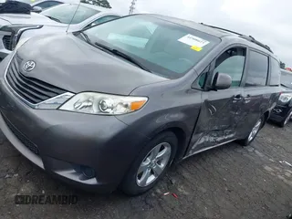 2014 Toyota Sienna LE AAS with VIN 5TDKK3DC3ES506466, listed as a IAAI auction lot 41908023 with 118,297 mi miles and . Bid and sale history available at carsss.com. Image 17.