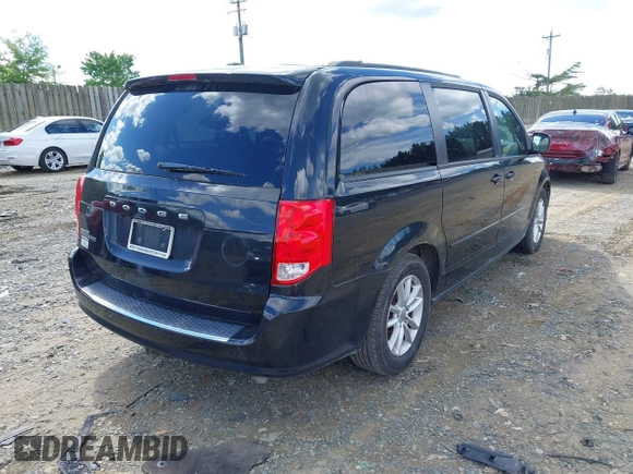 2013 Dodge Grand Caravan SXT with VIN 2C4RDGCG9DR563072, listed as a IAAI auction lot 42179166 with 211,008 mi miles and . Bid and sale history available at DreamBid. Image 4.