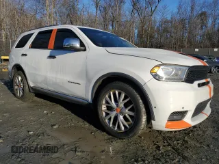 2014 Dodge Durango Citadel with VIN 1C4SDJET0EC391064, listed as a Copart auction lot 86631634 with 147,252 mi miles and Salvage Title. Bid and sale history available at DreamBid. Image 4.
