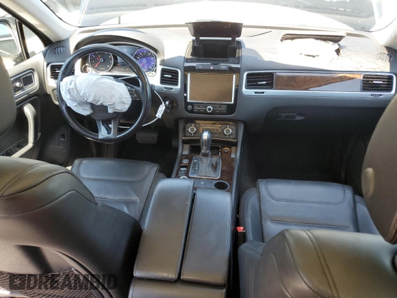 2013 Volkswagen Touareg Lux with VIN WVGEF9BP0DD001565, listed as a Copart auction lot 63070845 with 123,788 mi miles and Salvage title. Bid and sale history available at DreamBid. Image 8.