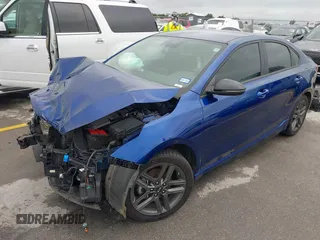 2021 Kia Forte GT-Line with VIN 3KPF34AD3ME403218, listed as a IAAI auction lot 42375319 with 56,621 mi miles and . Bid and sale history available at DreamBid. Image 2.