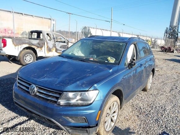 2019 Volkswagen Tiguan S with VIN 3VV0B7AX6KM067699, listed as a IAAI auction lot 41634351 with 181,093 mi miles. Bid and sale history available at carsss.com. Image 6.