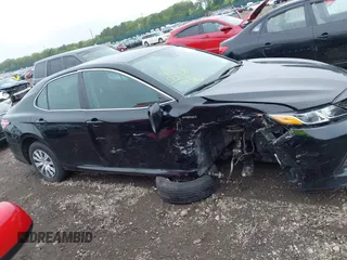 2019 Toyota Camry Hybrid LE z VIN 4T1B31HK5KU510055, wystawiony jako IAAI lot #42325522 z przebiegiem 97 000 mil mil oraz . Historia ofert i sprzedaży dostępna na DreamBid. Obrazek 13.