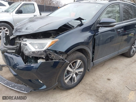 2017 Toyota RAV4 XLE with VIN JTMRFREV6HJ137349, listed as a IAAI auction lot 41542599 with 60,868 mi miles. Bid and sale history available at carsss.com. Image 18.