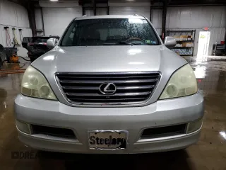 2005 Lexus GX 470 z VIN JTJBT20X250091141, wystawiony jako Copart lot #56942925 z przebiegiem 220 272 mil mil oraz Tytuł czysty. Historia ofert i sprzedaży dostępna na DreamBid. Obrazek 5.